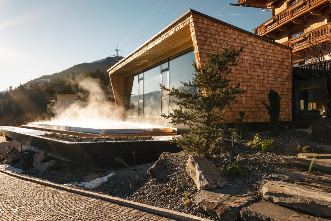 Aster Boutique Hotel & Chalets Fuegenberg Exterior foto
